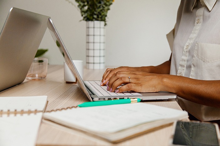 Business leader on her laptop